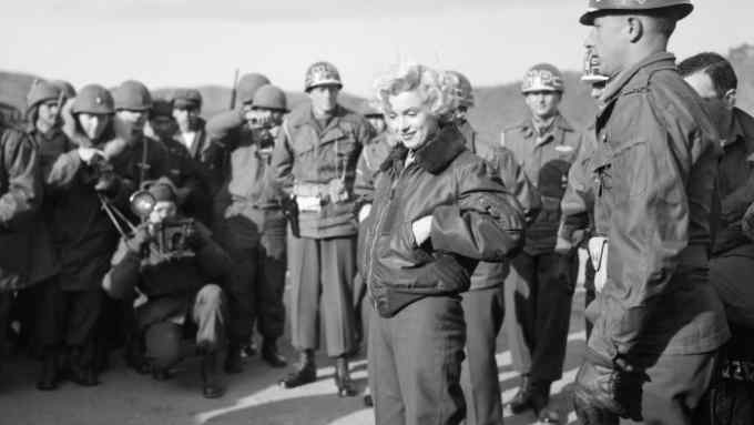 Marilyn Monroe visiting servicemen in 1954