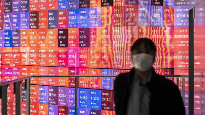 An electronic share price board showing Tokyo Stock Exchange data