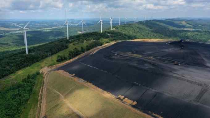 aerial view of  wind turbines installed on an exhausted coal mine